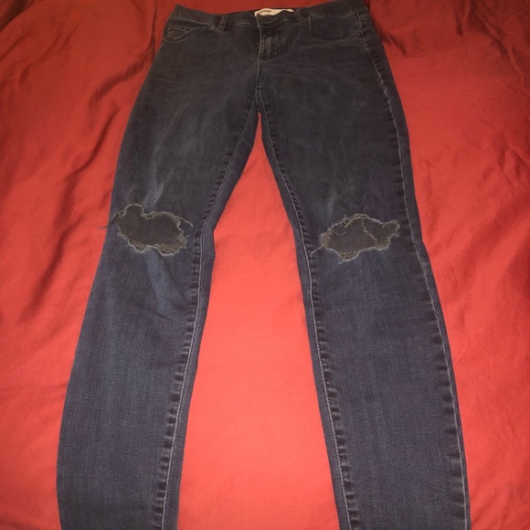 Garage black jeans with holes in knee